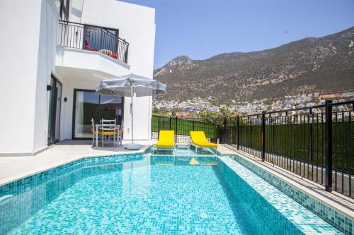 VİLLA BAY GÜNEY- Isıtmalı Havuzlu, Deniz Manzaralı Kiralık Villa