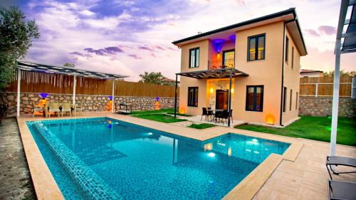 Villa Ersan 3 - Korunaklı Havuz Alanlı Villa Kiralama