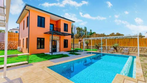 Villa Ersan 4 - Korunaklı Havuz Alanlı Villa Kiralama