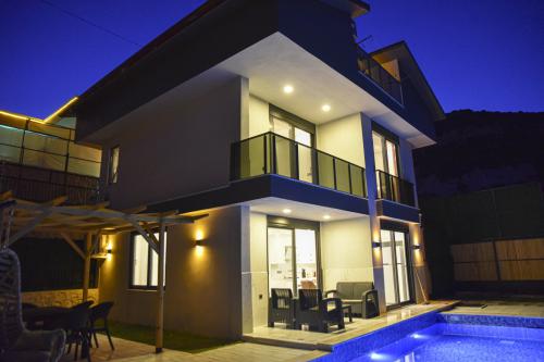 doga-manzarali-jakuzili-tatil-villasi-yesil-deniz-uno-1_638.JPG
