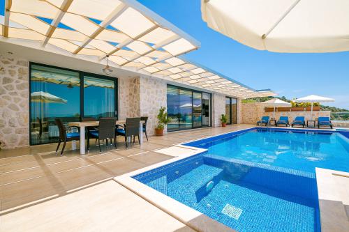 kalkan-bolgesinde-luks-muhafazakar-tatil-villa-luna-1_718.jpg