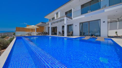 Villa Aspava| Kalkan Kördere Deniz Manzaralı Ultra Lüks 8 Kişilik Kiralık Villa